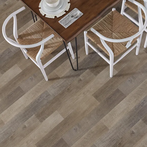 Dining area scene - looking down on table, two chairs, on waterproof laminate flooring.