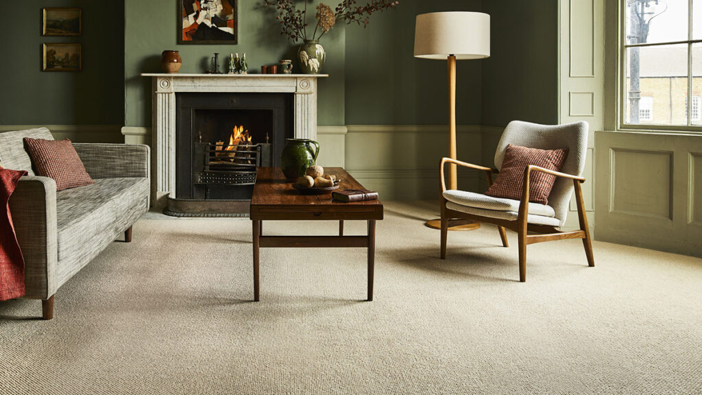 Living room scene with furniture and carpet.