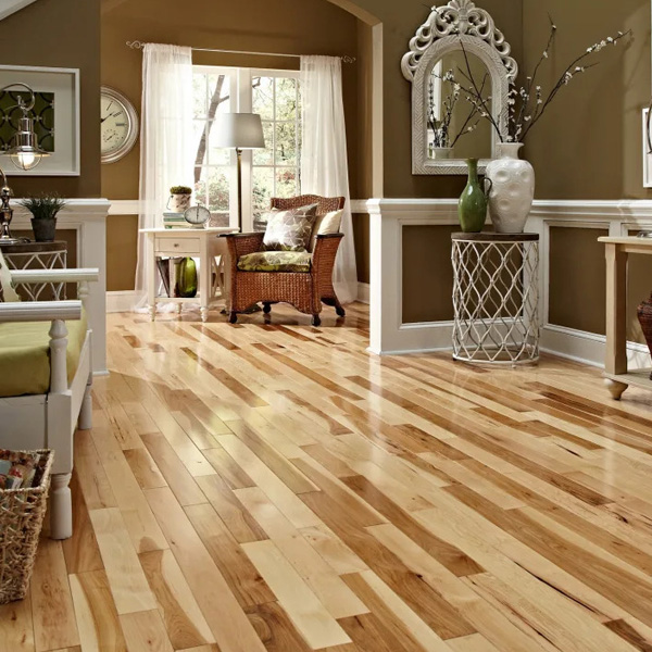 Living room scene with light-colored hardwood flooring.